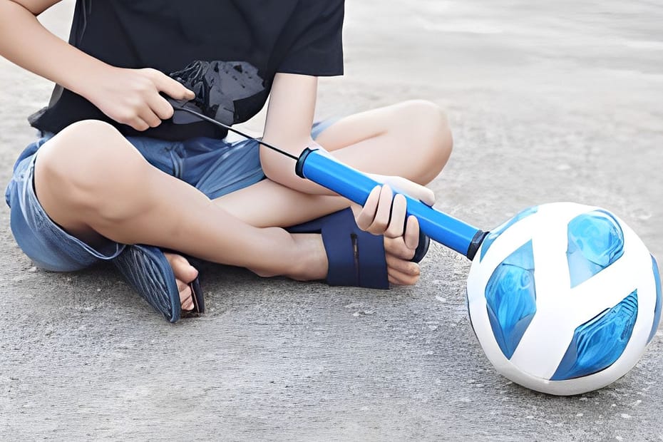 How to get a pump needle out of a soccer ball